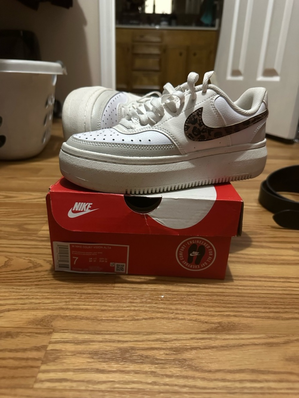 Nike Kids White Platform Sneakers with Leopard Swoosh Accent
